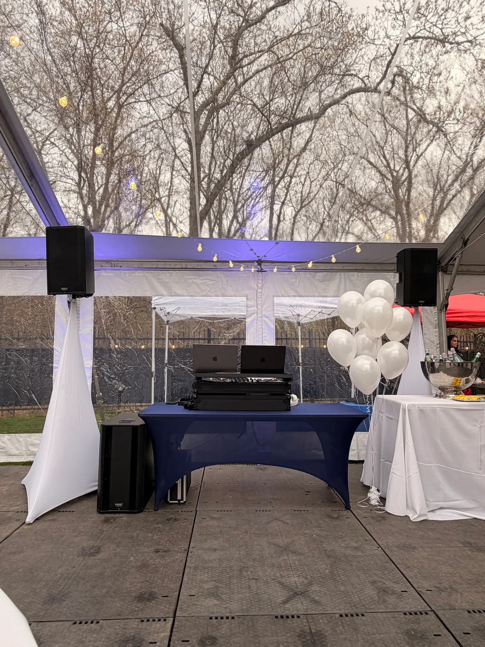 SKG Entertainment DJ booth and sound system set up in the tent